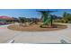 Community playground with swings, slides, and climbing equipment for children at 723 176Th Ave, Broomfield, CO 80023