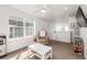 Playroom area featuring plush chair and a large window for natural light at 723 176Th Ave, Broomfield, CO 80023