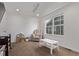 Cozy playroom area with a ceiling fan and plenty of natural light through the windows at 723 176Th Ave, Broomfield, CO 80023