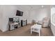 Spacious playroom is complete with carpeting, toys, and a ceiling fan at 723 176Th Ave, Broomfield, CO 80023