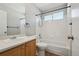 Clean bathroom featuring a shower-tub combo, vanity, and modern fixtures at 8588 Sweet Clover Way, Parker, CO 80134