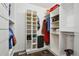 Walk-in closet with lots of shelving and storage options, offering ample space at 8588 Sweet Clover Way, Parker, CO 80134