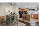 Bright dining area open to the kitchen, ideal for gatherings at 15800 E 121St Ave # 4K, Brighton, CO 80603