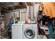 Functional laundry room featuring modern washer and dryer units at 15800 E 121St Ave # 4K, Brighton, CO 80603