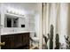 Basement bathroom with a shower/tub and vanity at 35 S Washington St # 1-2, Denver, CO 80209