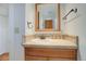 Bathroom with tiled shower and vanity at 35 S Washington St # 1-2, Denver, CO 80209