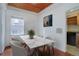 Elegant dining room with built-in shelving and hardwood floors at 35 S Washington St # 1-2, Denver, CO 80209