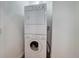 Stackable washer and dryer in laundry closet at 35 S Washington St # 1-2, Denver, CO 80209