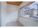 Sunroom with window seat and street view at 35 S Washington St # 1-2, Denver, CO 80209