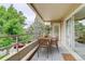 Cozy balcony featuring a small table and chairs, perfect for enjoying the outdoor view at 4605 S Yosemite St # 301, Denver, CO 80237