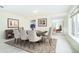 Dining room features a stylish rug under an elegant table with seating for eight at 4605 S Yosemite St # 301, Denver, CO 80237