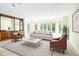 Bright living room with bay window, and elegant furnishings at 4605 S Yosemite St # 301, Denver, CO 80237