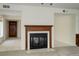 Open living room with tile flooring and fireplace at 4605 S Yosemite St # 301, Denver, CO 80237