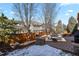 Relaxing brick back patio with outdoor furniture and fenced yard perfect for outdoor entertaining at 10828 Valleybrook Cir, Highlands Ranch, CO 80130