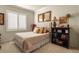 Comfortable bedroom with soft lighting, tasteful décor, and a cozy, inviting feel at 10828 Valleybrook Cir, Highlands Ranch, CO 80130