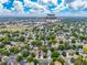 Aerial view showcasing the neighborhood's proximity to Walmart Supercenter and vast residential landscape at 12193 Deerfield Way, Broomfield, CO 80020