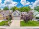 Aerial view of the house showcasing its well-kept lawn and neighborhood at 12193 Deerfield Way, Broomfield, CO 80020
