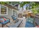 Inviting back deck with outdoor furniture and scenic views of the backyard at 12193 Deerfield Way, Broomfield, CO 80020