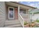 Close up of the front entrance with brick detail and decorative touches at 12193 Deerfield Way, Broomfield, CO 80020
