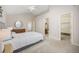 Spacious main bedroom with vaulted ceiling, an ensuite bathroom, and a walk-in closet at 12193 Deerfield Way, Broomfield, CO 80020