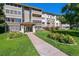 Attractive building exterior with landscaping and entryway at 750 S Alton Way # 4B, Denver, CO 80247