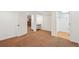 Finished basement area with carpet flooring, closet and possible office nook area, great for flexible living at 20087 E Dartmouth Dr, Aurora, CO 80013