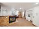Spacious finished basement with a bar, fireplace, and room for entertaining at 20087 E Dartmouth Dr, Aurora, CO 80013
