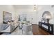 Bright living room with high ceilings and hardwood floors, perfect for entertaining guests at 20087 E Dartmouth Dr, Aurora, CO 80013