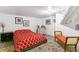Finished basement bedroom with a cozy bed, decor, and unique character at 2614 E 13Th Ave, Denver, CO 80206