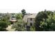 Aerial shot of the home highlighting its architecture, mature trees, and neighborhood setting at 3330 Bruce Randolph Ave, Denver, CO 80205