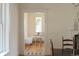 Cozy breakfast nook with a built-in bench, a stool, and natural light at 3330 Bruce Randolph Ave, Denver, CO 80205