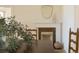 Dining room with a large table in front of a fireplace at 3330 Bruce Randolph Ave, Denver, CO 80205