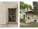 Charming home featuring vintage diamond-patterned windows and a brick facade with a covered porch at 3330 Bruce Randolph Ave, Denver, CO 80205