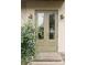 Inviting front entryway with double doors and a charming stone steps, perfect for a warm welcome at 3330 Bruce Randolph Ave, Denver, CO 80205