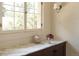 Marble counter beside large window offers counter space in this kitchen at 3330 Bruce Randolph Ave, Denver, CO 80205