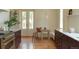 Eat in kitchen with table, seating, and stainless gas range at 3330 Bruce Randolph Ave, Denver, CO 80205