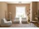 Living room with lots of light and comfortable chairs with a large rug at 3330 Bruce Randolph Ave, Denver, CO 80205