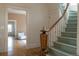 View of the staircase featuring the details and the natural light from the windows at 3330 Bruce Randolph Ave, Denver, CO 80205