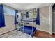 Fun bunk beds in this bedroom and large windows for the upper bunk sleepers at 5477 E Asbury Ave, Denver, CO 80222