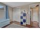 Storage is easy in this bedroom with a closet and box shelves for storing clothes at 5477 E Asbury Ave, Denver, CO 80222