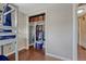 Bedroom features a large closet with shelving at 5477 E Asbury Ave, Denver, CO 80222
