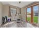 Light-filled exercise room with french doors leading to backyard at 5477 E Asbury Ave, Denver, CO 80222