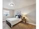 Bright bedroom with neutral walls and carpet, and a comfy twin bed at 19431 E Hamilton Pl, Aurora, CO 80013