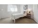 Bright, cozy bedroom with neutral tones and a twin bed at 19431 E Hamilton Pl, Aurora, CO 80013