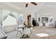 Elegant dining area with large windows, vaulted ceilings, and stylish chairs, ideal for hosting gatherings at 19431 E Hamilton Pl, Aurora, CO 80013