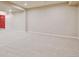 The finished basement offers an expansive area with soft carpeting, ready for customization and Gathering activities at 2454 Ambience Ln, Castle Rock, CO 80109