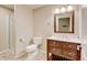 Bathroom featuring vanity with under-cabinet storage, shower, and a modern toilet and fixtures at 2454 Ambience Ln, Castle Rock, CO 80109