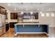 Well-equipped kitchen with granite countertops, stainless steel appliances, and ample cabinet space at 2454 Ambience Ln, Castle Rock, CO 80109