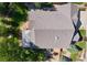 Overhead view of the house reveals a well-maintained roof and backyard area with mature trees offering ample shade at 7472 Iridium Way, Castle Rock, CO 80108