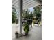 Comfortable patio area with an outdoor dining set, umbrella and pergola perfect for relaxing or entertaining guests at 7472 Iridium Way, Castle Rock, CO 80108